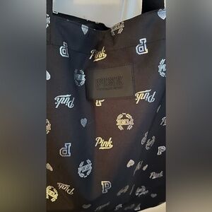 Black and silver zipper bag. By PINK